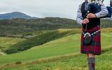 Dudelsackspieler Highlands Schottland